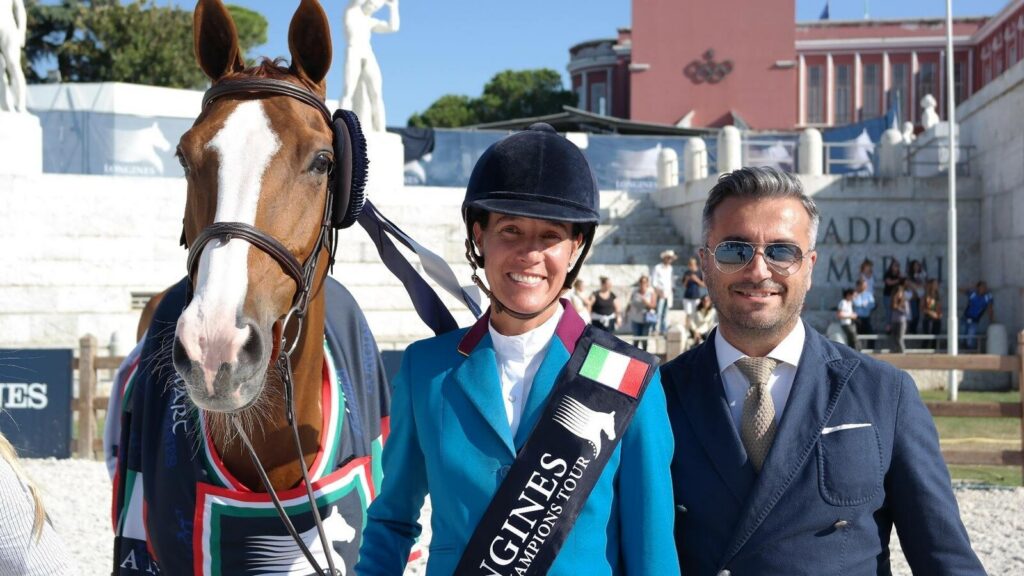 Luciana Diniz with Alessandro Albanese after winning the grand prix at the Longines Global Champions Tour in Rome, Italy
