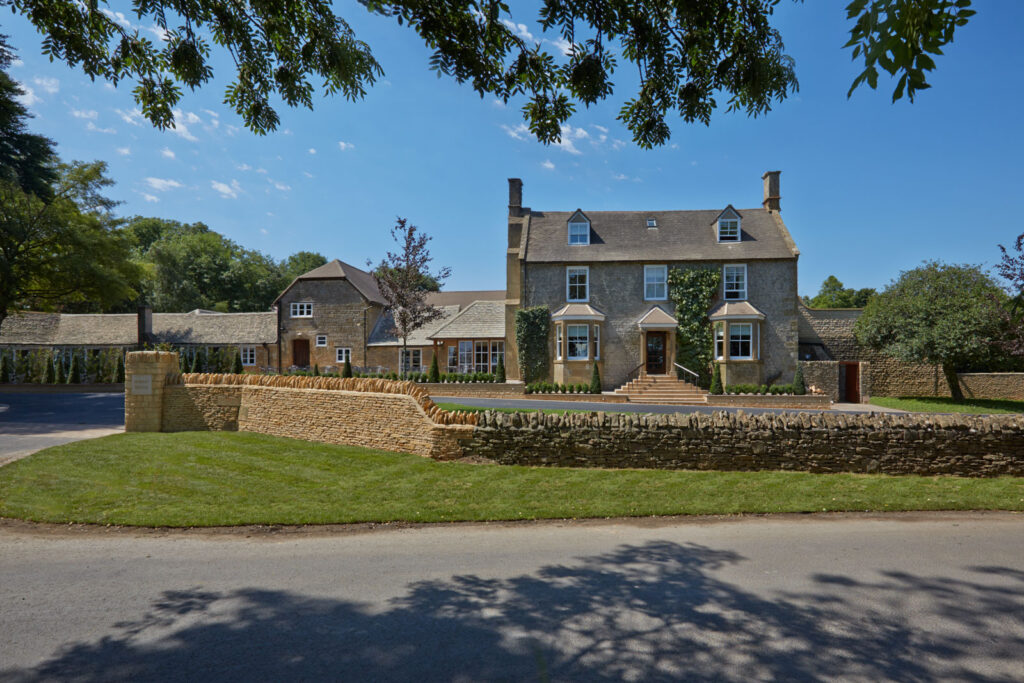 Dormy House exterior on a sunny day in the Cotswolds