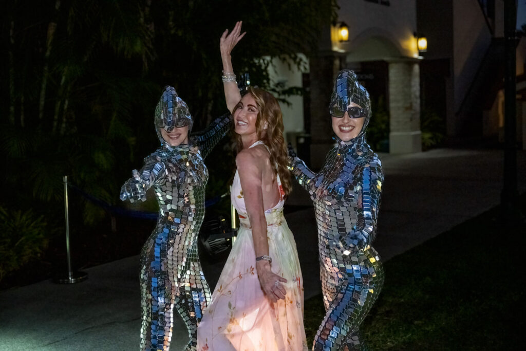 PJ Rizvi with dancers at the Polo for a Purpose gala