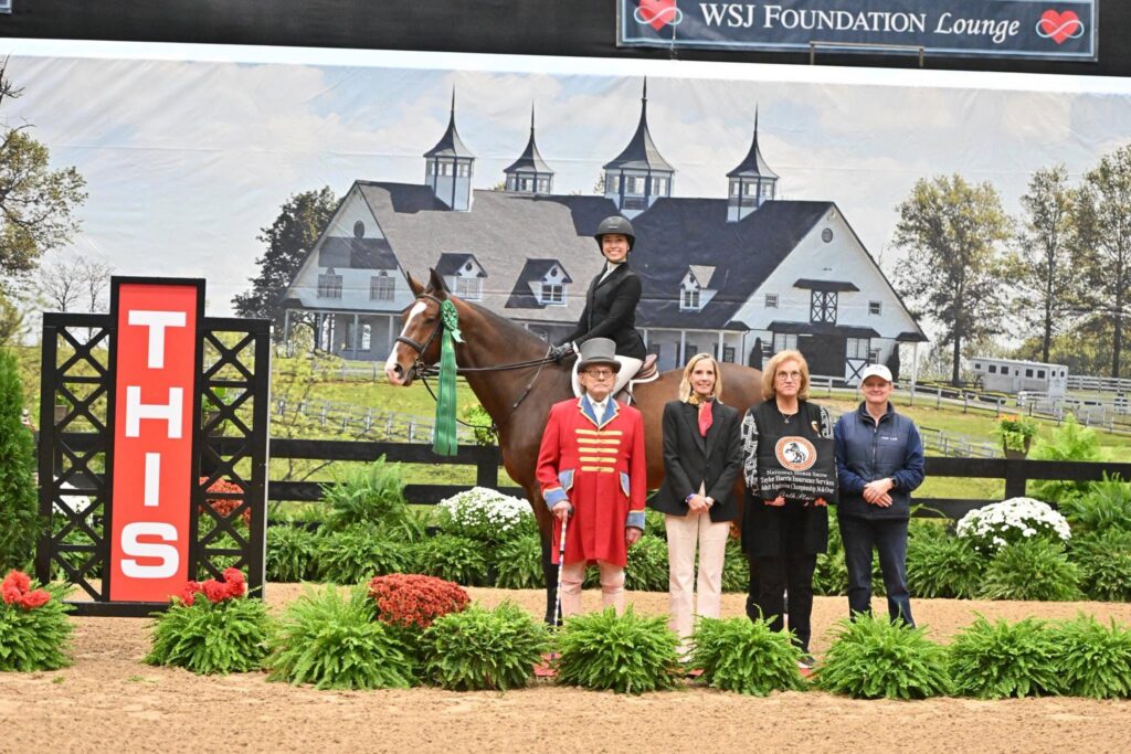 Kristina Christiansen and Cordoba 73 in the winners’ circle at the 2025 National Horse Show